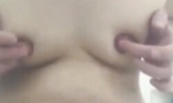 Mature playing with extreme big nipples