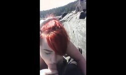 Red hair painted girl sucks dick outdoors and swallows