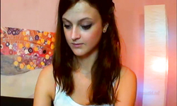 Slender Russian cutie fucks herself by using a big red dildo