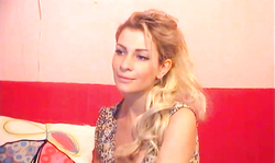 Sexy Russian blonde with a fuckable booty is getting rid of her dress