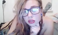 Naughty Chick with glasses masturbating