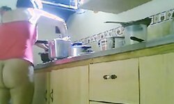 LATINA MATURE NUDE KITCHEN