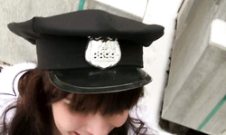 Great-looking brunette is giving a hot outdoor upskirt