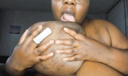 BBW Tina plays with her sexy huge black tits and dildo