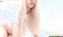 Petite Blonde Babe bends over and masturbates