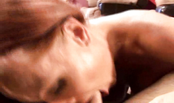 Adorable redhead girl is giving a deep blowjob while being on the knees