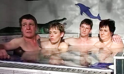 Matures are sucking two cocks simultaneously in the bath tube