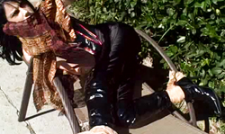 Tattooed Spandex brunette in awesome black corset!