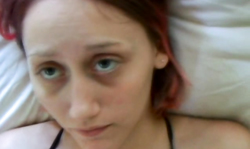 Redhead with innocent eyes is truing anal sex on stolen video