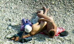 Milf is giving her lover a nice treat right on the beach