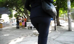 Hot-looking big booty chick in white shirt and black jacket