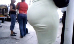 Very tight white pants are making her big booty even sexier!