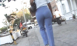 Sexy-looking big booty bitch in very long blue pants