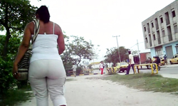 Unimaginable big ass of a lady in tight white outfit