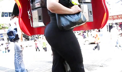 Babe in very tight black outfit is trying to emphasize the size of her big ass