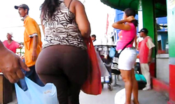 Five star big booty of a black-haired lady in brown pants