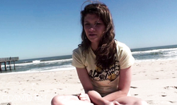 Sweet Cosmid lady is doing some exercises on the beach