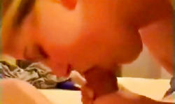 Bitchy wife gives a passionate blowjob in the close-up