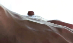 Lusty oiled girl is getting her snatch stimulated with a Little Mutt