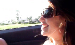 Busty girlfriend in sunglasses shows off her naked boobs