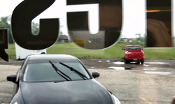 Seductive Nikki Sims pours some water on her boobs