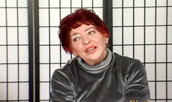 Redhead granny sticks a rubber sex toy in her hairy muff