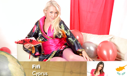 Blondie MILF in Asian bathrobe is lying on the sofa