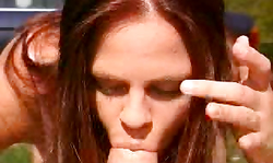 Redhead babe Queeny Love gives a perfect outdoor blowjob