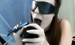 Blindfolded slut Queeny Love pose in a see-through robe