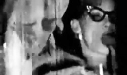 Sexy Retro cutie in glasses is sucking a hard dick like a pro