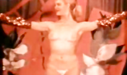 Elegant Retro dancer slowly undresses on the stage