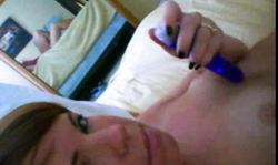 Sweet teen girlfriend with blue toy stimulates her trimmed crack