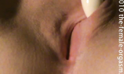 Angelic babe stimulates tight shaved pussy in the close-up