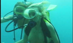 Sweet underwater action of two big-breasted divers