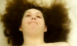 Impressive small-tit brunette in red lingerie trains her breath