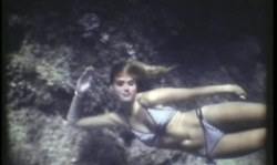 Two naked divers are showing how beautiful their bodies are