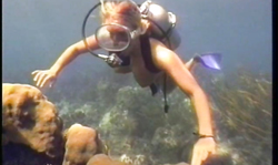 Amazingly hot underwater dance of a long-legged diver