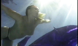 Sweet underwater dance of a leggy mademoiselle in blue dress