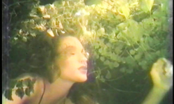 Sensual underwater photo shoot of a long-legged cutie