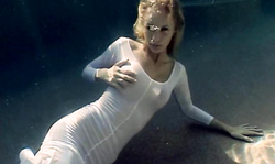 Angelic big-boobed babe in white dress poses Underwater