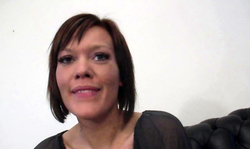 Stunning busty brunette with blue eyes plays with a pink toy