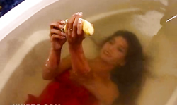 Smoking brunette in red lingerie poses hot Underwater