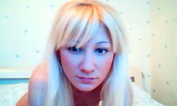 Golden Russian blondie poses naked and masturbates on webcam
