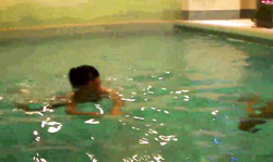 Brunette whore Aische Pervers performs a blowjob in the pool