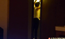 Voyeur action in local hotel with a cute Asian girl