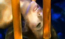 Caged interracial couple has sex in the Underwater cage