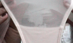 Hot-looking Satin Jayde shows her cute wet panties