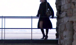 Woman in black Satin Jayde flashed her white underwear