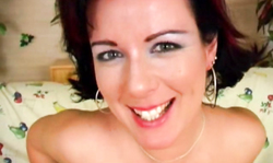 Busty Amateur MILF on high heels pushes a dildo into her cunt