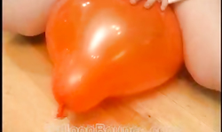 Small-tit lady in sleepwear rides her favorite orange balloon